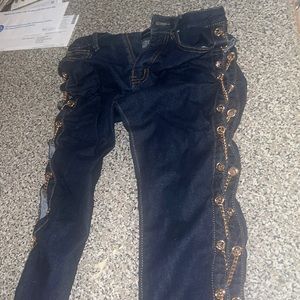 Super cute! open on the side with chains. Size 3 fashion nova jeans never worn.